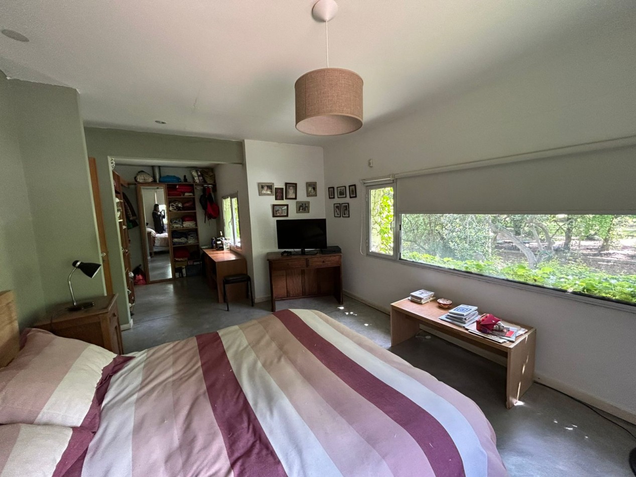 CASA EN PH 4 AMBIENTES CON ESCRITORIO, QUINCHO Y PARQUE. APTO CREDITO