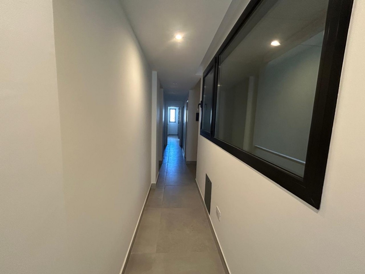 DEPARTAMENTO SEMIPISO A ESTRENAR 2 AMBIENTES CON COCHERA Y BAULERA. 