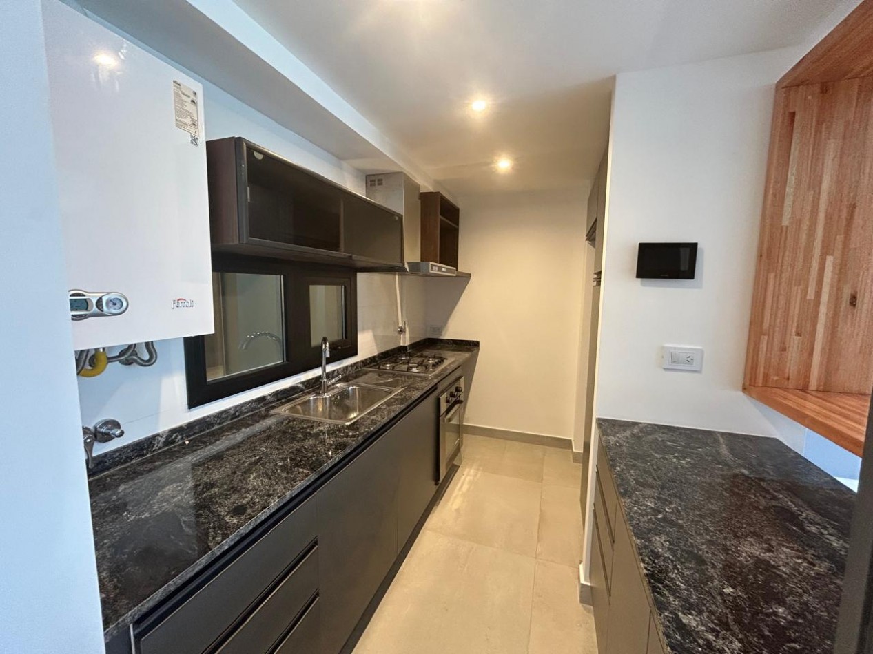 DEPARTAMENTO SEMIPISO A ESTRENAR 2 AMBIENTES CON COCHERA Y BAULERA. 