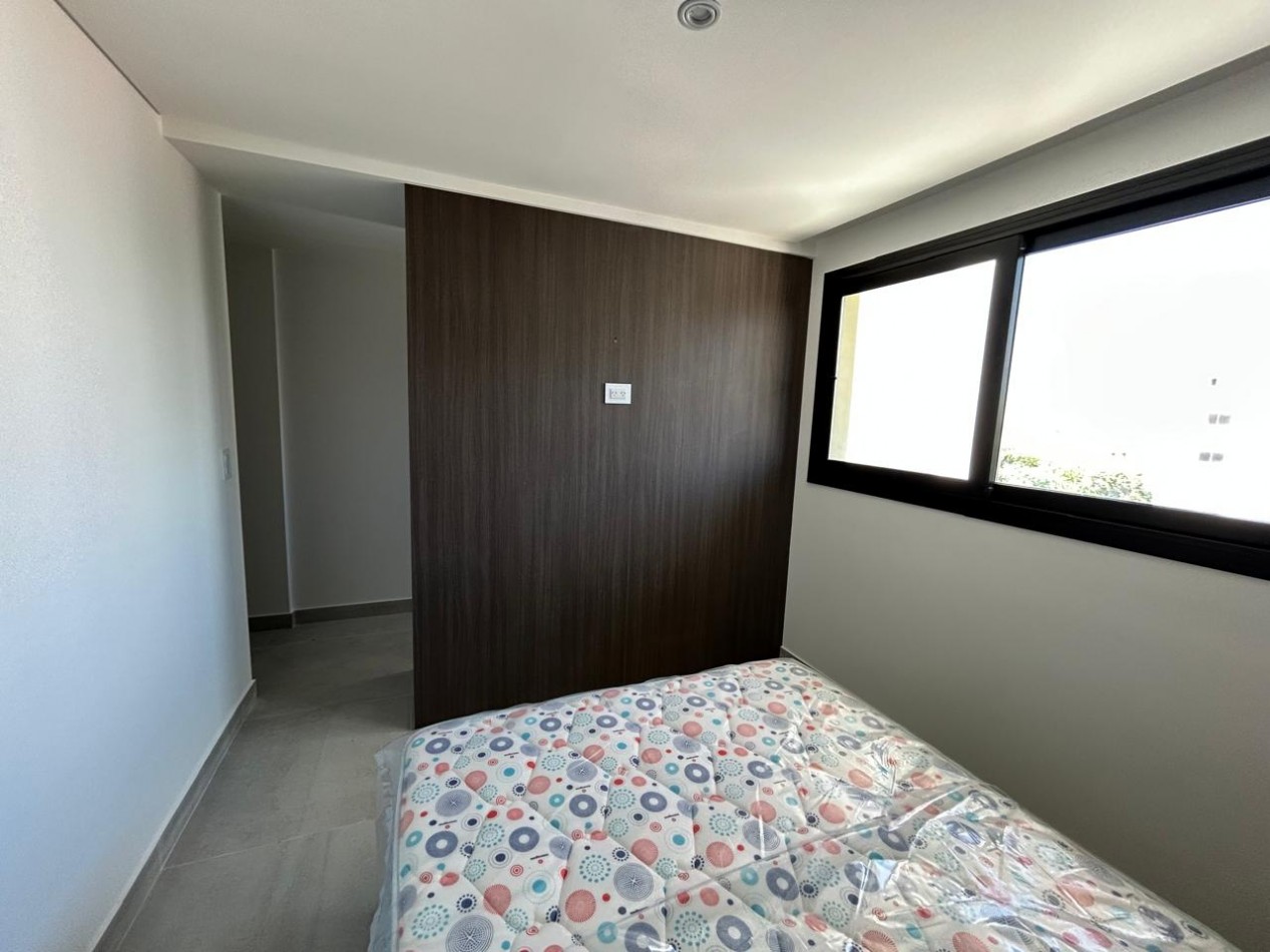 DEPARTAMENTO SEMIPISO A ESTRENAR 2 AMBIENTES CON COCHERA Y BAULERA. 