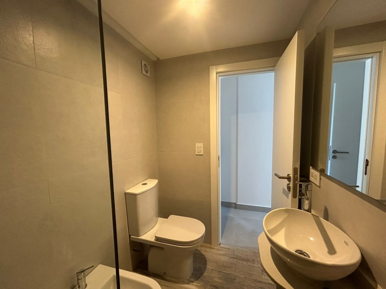 DEPARTAMENTO SEMIPISO A ESTRENAR 2 AMBIENTES CON COCHERA Y BAULERA. 