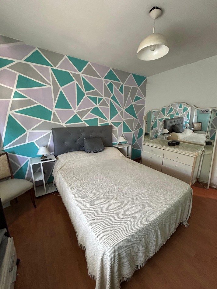 DEPARTAMENTO DOS AMBIENTES CON COCHERA .POR ESCALERA APTO CREDITO