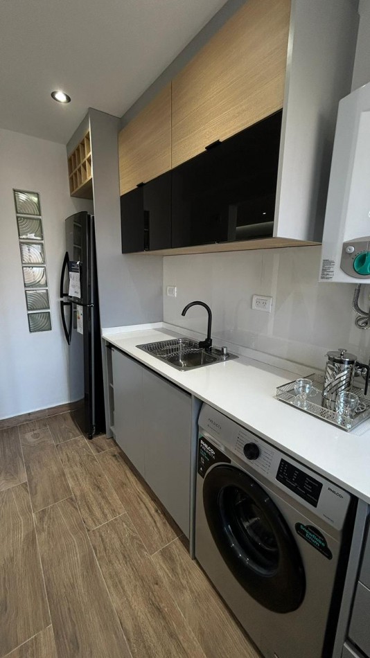 DEPARTAMENTO DOS AMBIENTES CON DEPENDENCIA.COCHERA DOBLE .LA PERLA