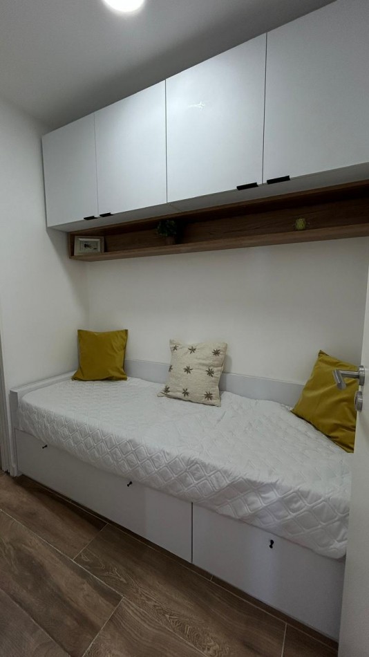 DEPARTAMENTO DOS AMBIENTES CON DEPENDENCIA.COCHERA DOBLE .LA PERLA