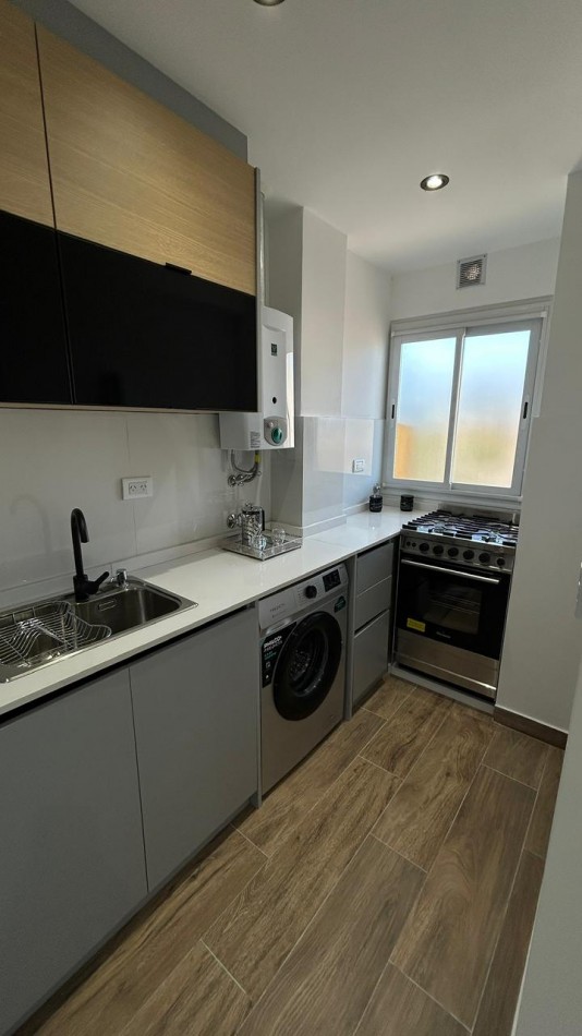 DEPARTAMENTO DOS AMBIENTES CON DEPENDENCIA.COCHERA DOBLE .LA PERLA