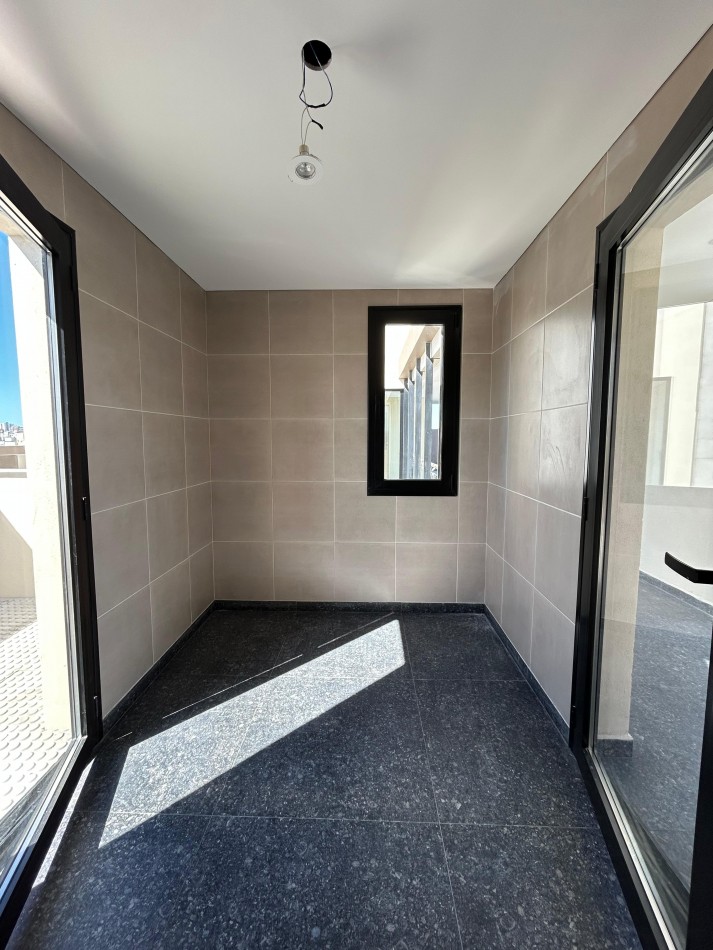 DEPARTAMENTO 2 AMBIENTES A ESTRENAR CON COCHERA. CHAUVIN